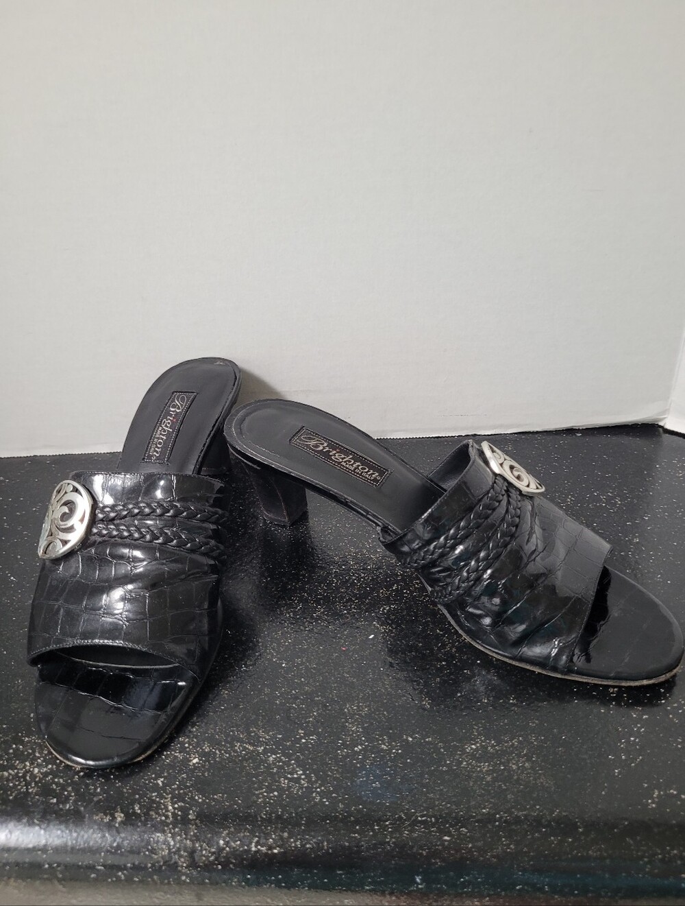 Brighton Black Croc-Embossed Braided Slide Heels with Silver Medallion